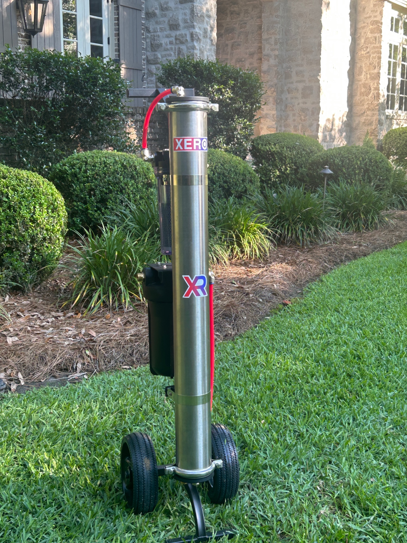 SB Window Cleaning water-fed pole system filtering pure water in Valdosta, GA